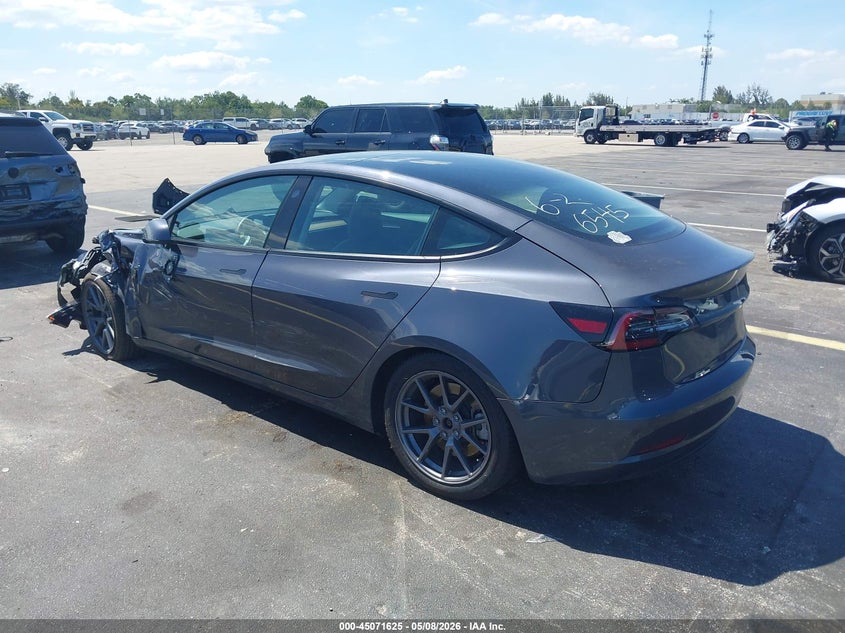 2023 Tesla Model 3 VIN 5YJ3E1EA7PF566545 IAAI salvage auction — LEFT SIDE, Rebuildable (Florida), sold $5,900 on 2026-07-29 (photo 3)