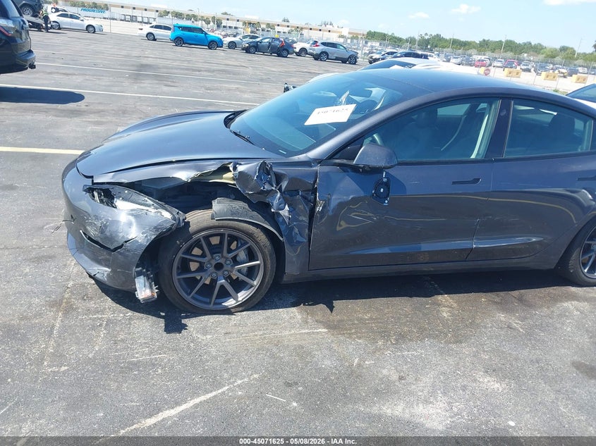 2023 Tesla Model 3 VIN 5YJ3E1EA7PF566545 IAAI salvage auction — LEFT SIDE, Rebuildable (Florida), sold $5,900 on 2026-07-29 (photo 6)