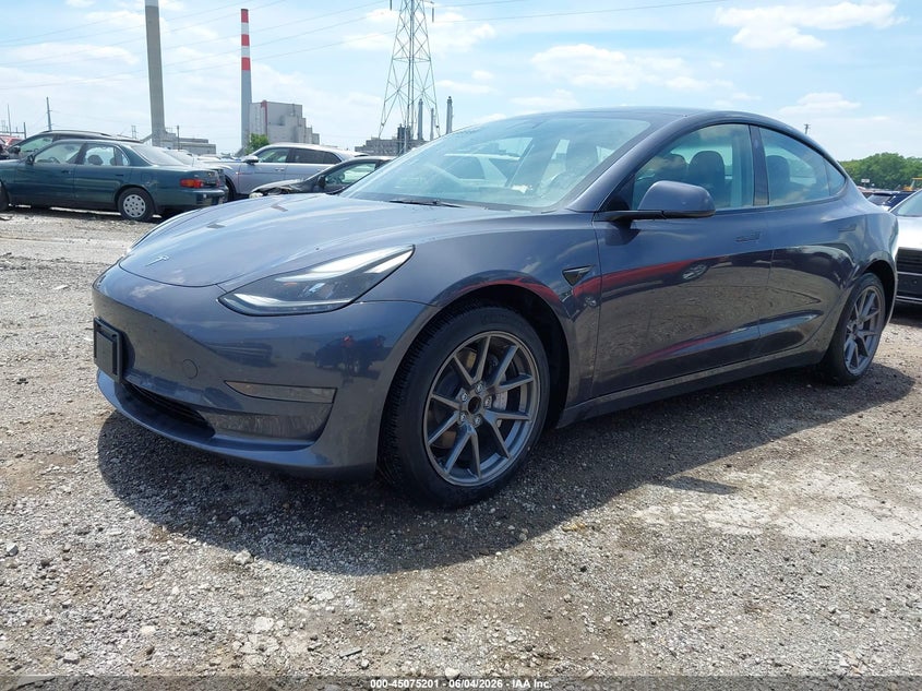 2023 Tesla Model 3 VIN 5YJ3E1EA7PF408934 IAAI salvage auction — NORMAL WEAR, Sf97 (Indiana), sold $25,250 on 2026-07-15 (photo 2)