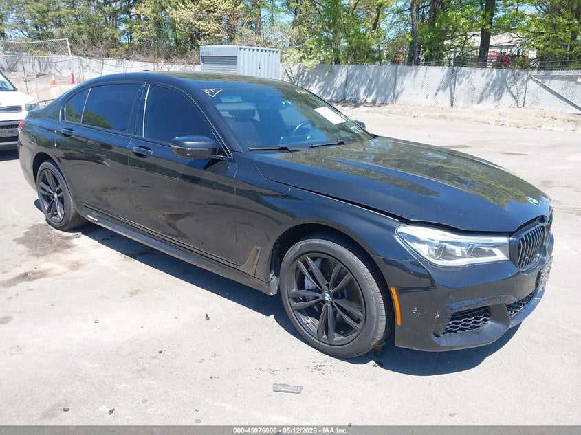 2018 BMW 7er VIN WBA7F2C54JB238713 IAAI salvage auction — WATER/FLOOD, Mv-907A (New York), sold $5,850 on 2026-08-18 (photo 1)