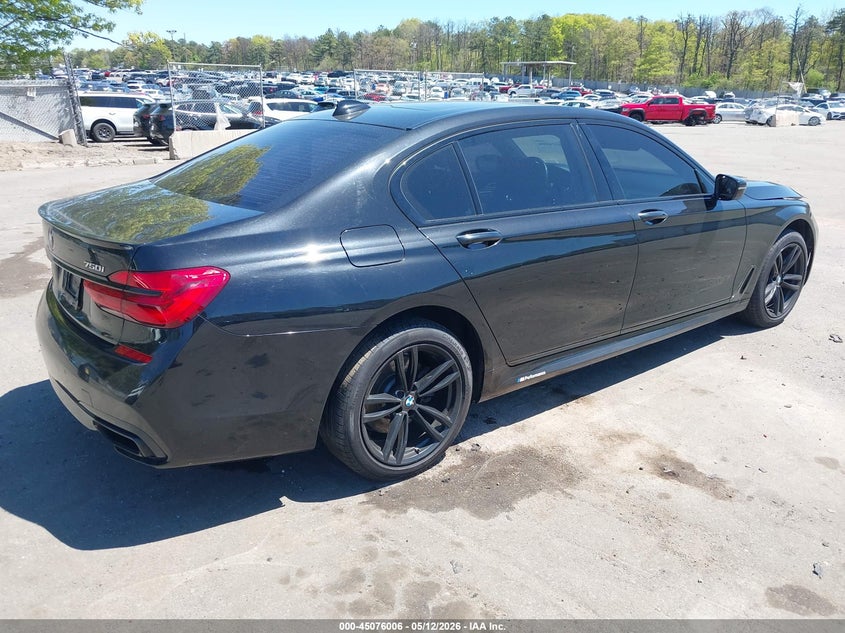 2018 BMW 7er VIN WBA7F2C54JB238713 IAAI salvage auction — WATER/FLOOD, Mv-907A (New York), sold $5,850 on 2026-08-18 (photo 4)