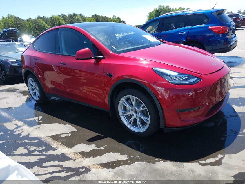 2023 Tesla Model y VIN 7SAYGDEE1PA126020 IAAI salvage auction — LEFT SIDE, Salvage (North Carolina), sold $11,000 on 2026-07-31 (photo 1)