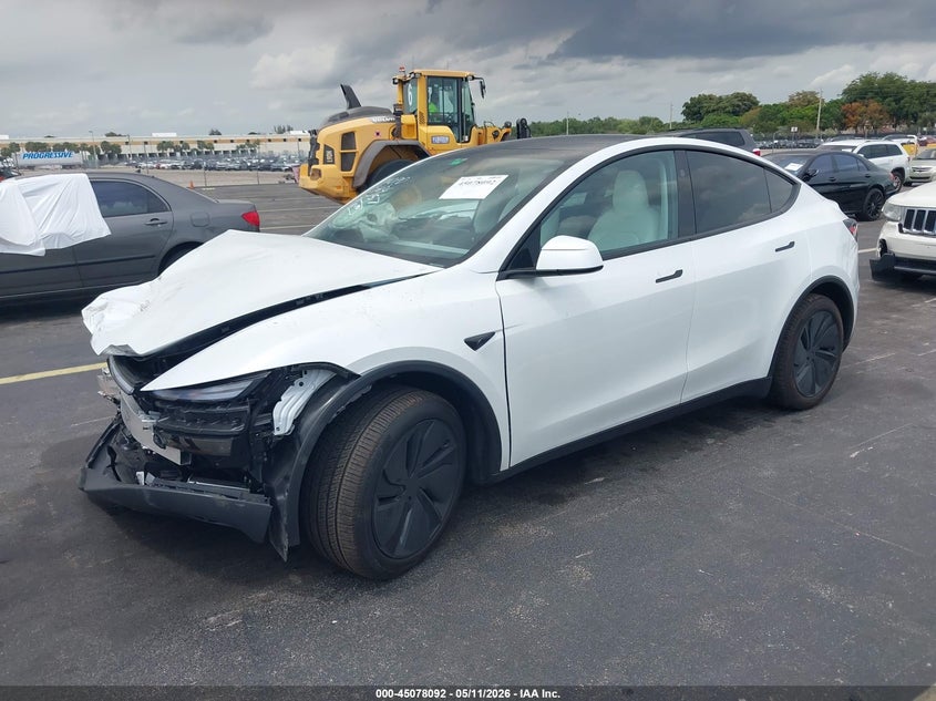2026 Tesla Model y VIN 7SAYGDED1TA580057 IAAI salvage auction — RIGHT FRONT, Rebuildable (Florida), sold $17,200 on 2026-07-30 (photo 2)