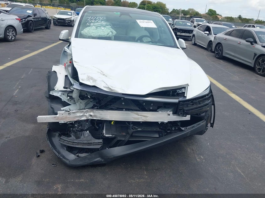 2026 Tesla Model y VIN 7SAYGDED1TA580057 IAAI salvage auction — RIGHT FRONT, Rebuildable (Florida), sold $17,200 on 2026-07-30 (photo 6)