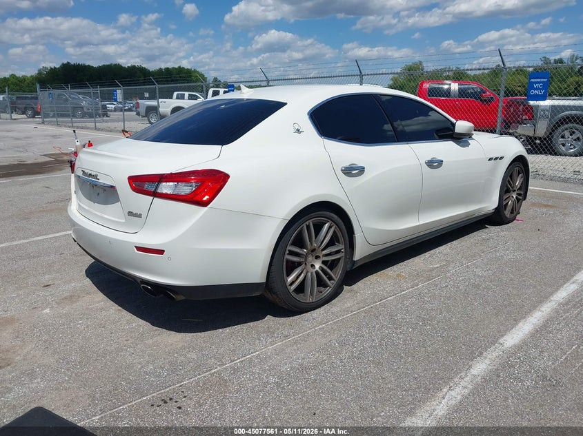 2014 Maserati Ghibli VIN ZAM57RTA1E1109736 IAAI salvage auction — SIDE, Clear (Indiana), sold $3,150 on 2026-08-06 (photo 4)