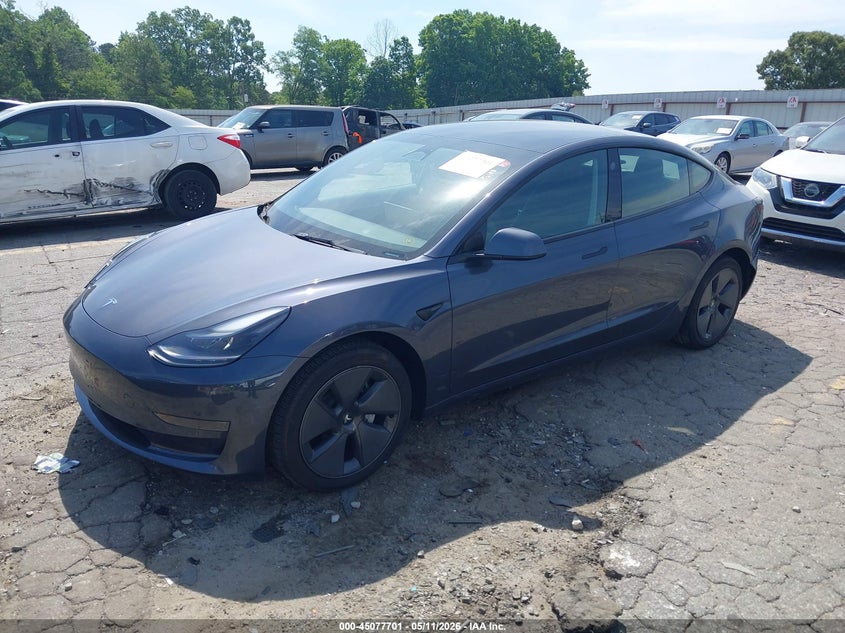 2023 Tesla Model 3 VIN 5YJ3E1EAXPF472742 IAAI salvage auction — SIDE, Salvage (Georgia), sold $7,625 on 2026-07-09 (photo 2)