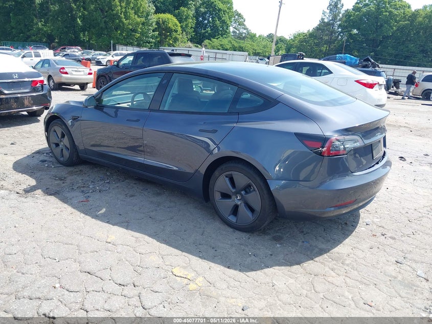 2023 Tesla Model 3 VIN 5YJ3E1EAXPF472742 IAAI salvage auction — SIDE, Salvage (Georgia), sold $7,625 on 2026-07-09 (photo 3)