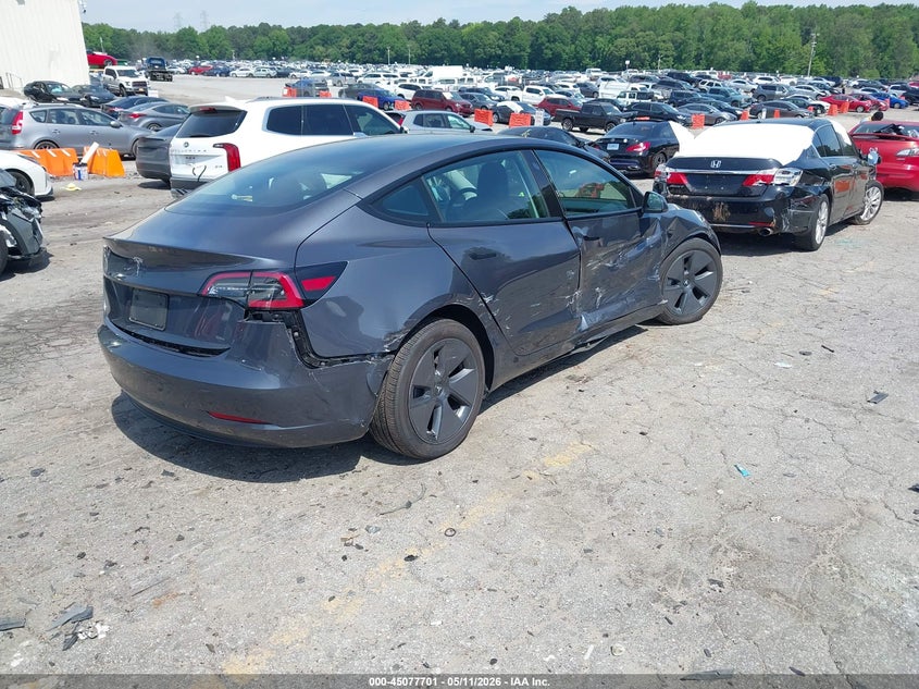 2023 Tesla Model 3 VIN 5YJ3E1EAXPF472742 IAAI salvage auction — SIDE, Salvage (Georgia), sold $7,625 on 2026-07-09 (photo 4)