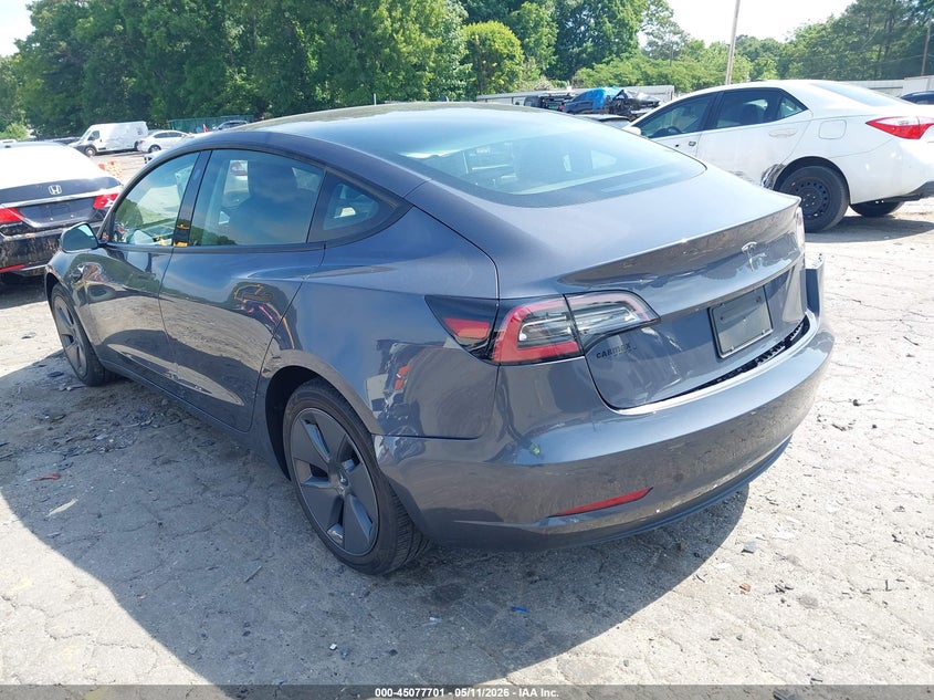 2023 Tesla Model 3 VIN 5YJ3E1EAXPF472742 IAAI salvage auction — SIDE, Salvage (Georgia), sold $7,625 on 2026-07-09 (photo 6)