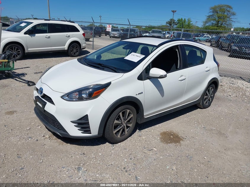 2018 Toyota Prius c VIN JTDKDTB31J1615383 IAAI salvage auction — WATER/FLOOD, Salvage (Illinois), sold $5,500 on 2026-07-24 (photo 2)