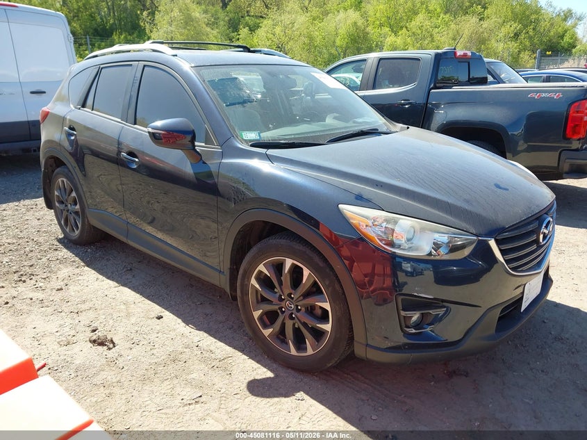 2016 Mazda Cx-5 VIN JM3KE4DY8G0823682 IAAI salvage auction — LEFT SIDE, Salvage (Illinois), sold $4,250 on 2026-07-09 (photo 1)