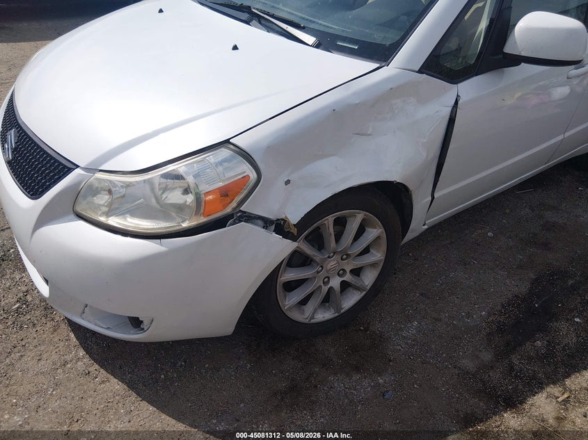 2011 Suzuki Sx4 VIN JS2YC5A28B6302925 IAAI salvage auction — LEFT FRONT, Salvage (Kansas), sold $800 on 2026-07-17 (photo 6)