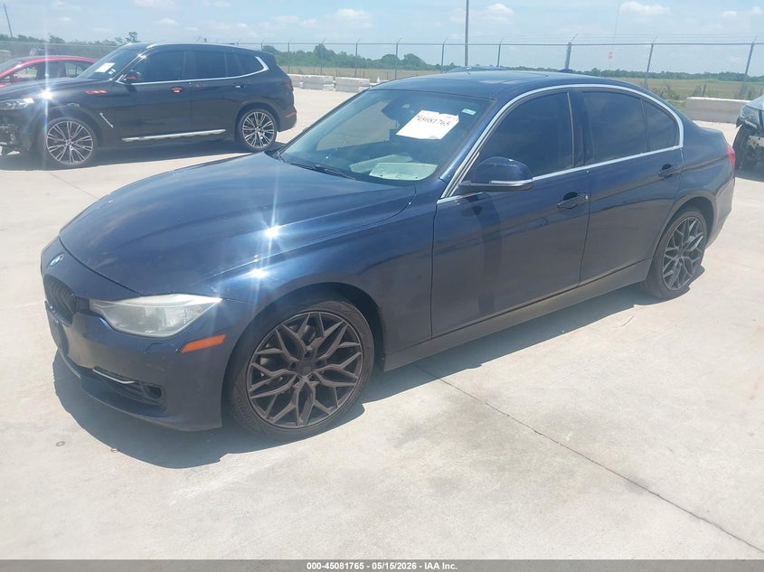 2014 BMW VIN WBA3B3G51ENR83448 IAAI salvage auction — WATER/FLOOD, Salvage (Texas), sold $350 on 2026-07-31 (photo 2)