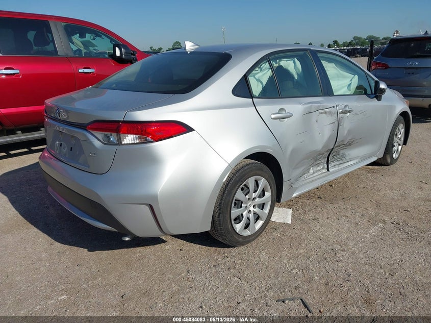 2021 Toyota Corolla VIN JTDEPMAE5MJ144971 IAAI salvage auction — SIDE, Original (Texas), sold $9,000 on 2026-07-14 (photo 4)