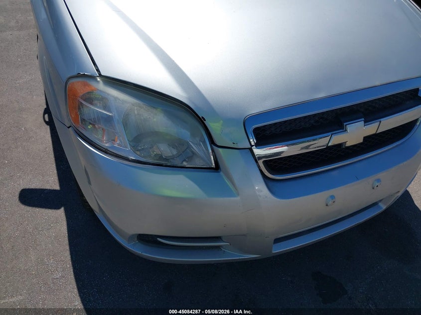 2011 Chevrolet Aveo VIN KL1TD5DEXBB210320 IAAI salvage auction — NORMAL WEAR, Clear (Texas), sold $300 on 2026-07-14 (photo 6)