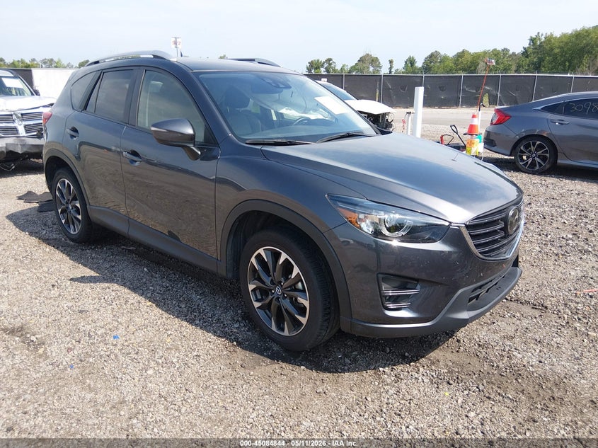 2016 Mazda Cx-5 VIN JM3KE4DY3G0893204 IAAI salvage auction — SIDE, Clear (South Carolina), sold $5,600 on 2026-07-14 (photo 1)