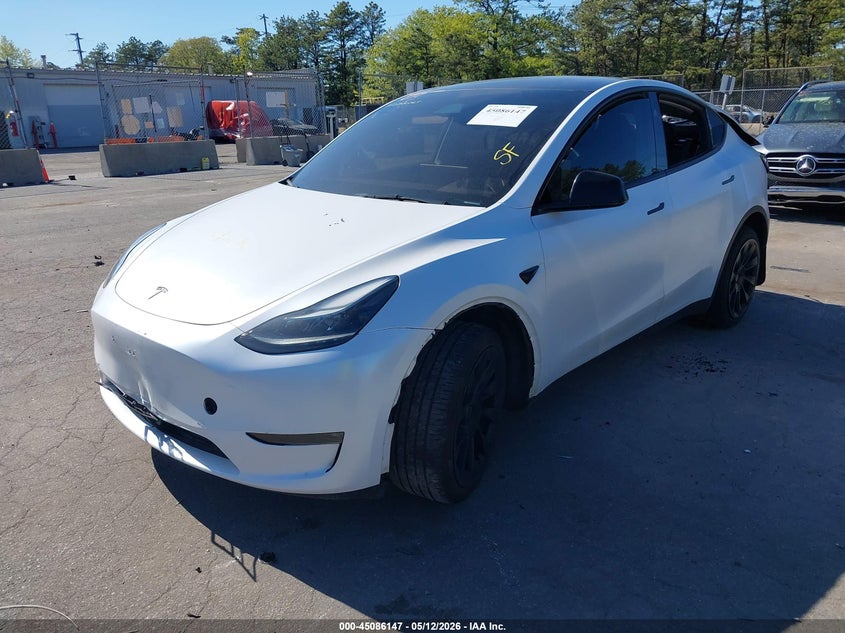 2023 Tesla Model y VIN 7SAYGDEE3PA187305 IAAI salvage auction — REAR END, Mv-907A (New York), sold $8,000 on 2026-07-14 (photo 2)