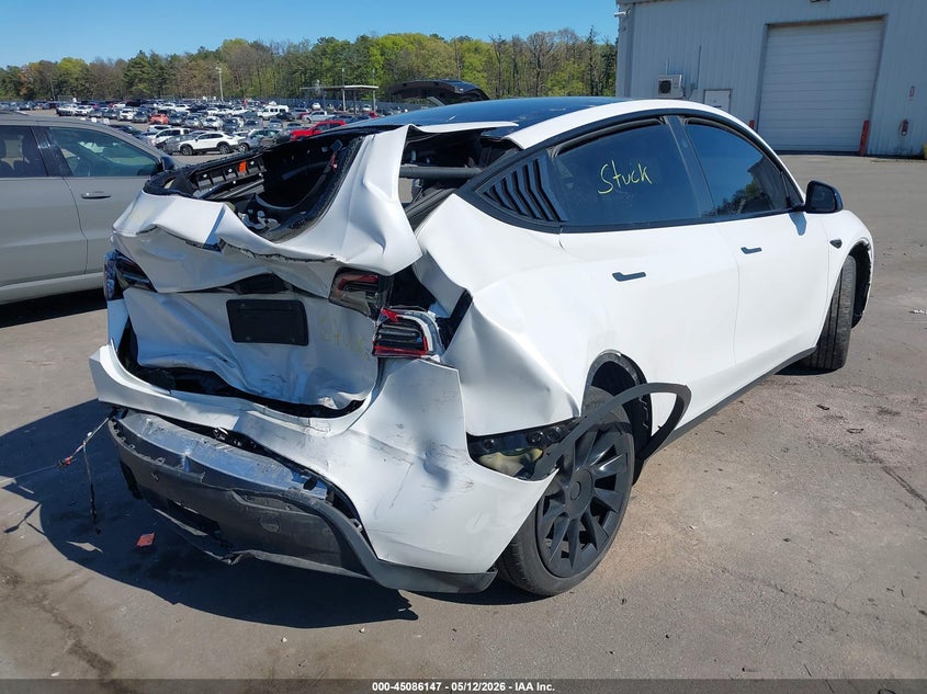 2023 Tesla Model y VIN 7SAYGDEE3PA187305 IAAI salvage auction — REAR END, Mv-907A (New York), sold $8,000 on 2026-07-14 (photo 4)
