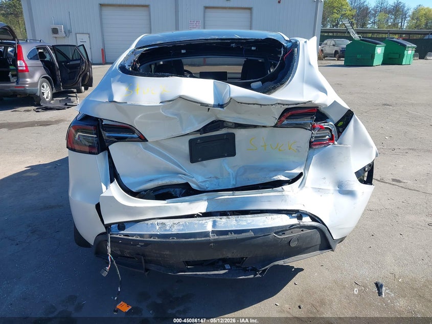 2023 Tesla Model y VIN 7SAYGDEE3PA187305 IAAI salvage auction — REAR END, Mv-907A (New York), sold $8,000 on 2026-07-14 (photo 6)