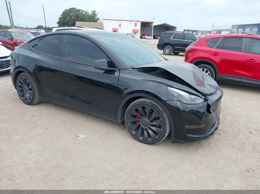 2024 Tesla Model y VIN 7SAYGDEF6RA304094 IAAI salvage auction — FRONT END, Rebuildable (Florida), sold $14,200 on 2026-07-20 (photo 1)