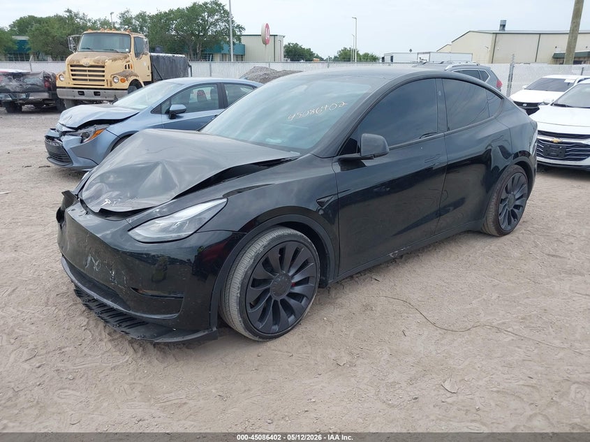 2024 Tesla Model y VIN 7SAYGDEF6RA304094 IAAI salvage auction — FRONT END, Rebuildable (Florida), sold $14,200 on 2026-07-20 (photo 2)