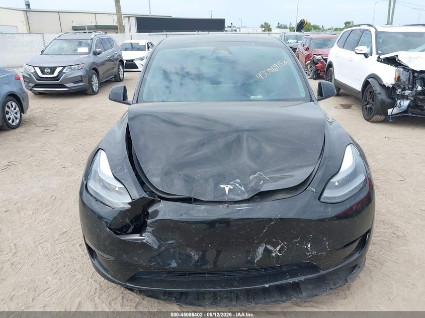 2024 Tesla Model y VIN 7SAYGDEF6RA304094 IAAI salvage auction — FRONT END, Rebuildable (Florida), sold $14,200 on 2026-07-20 (photo 6)