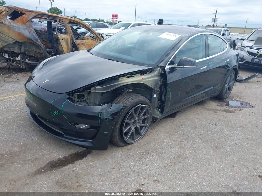 2018 Tesla Model 3 VIN 5YJ3E1EA6JF057148 IAAI salvage auction — LEFT FRONT, Original (Texas), sold $5,600 on 2026-07-29 (photo 2)