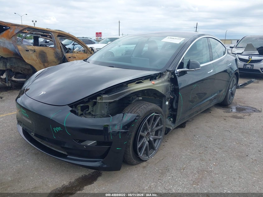2018 Tesla Model 3 VIN 5YJ3E1EA6JF057148 IAAI salvage auction — LEFT FRONT, Original (Texas), sold $5,600 on 2026-07-29 (photo 6)
