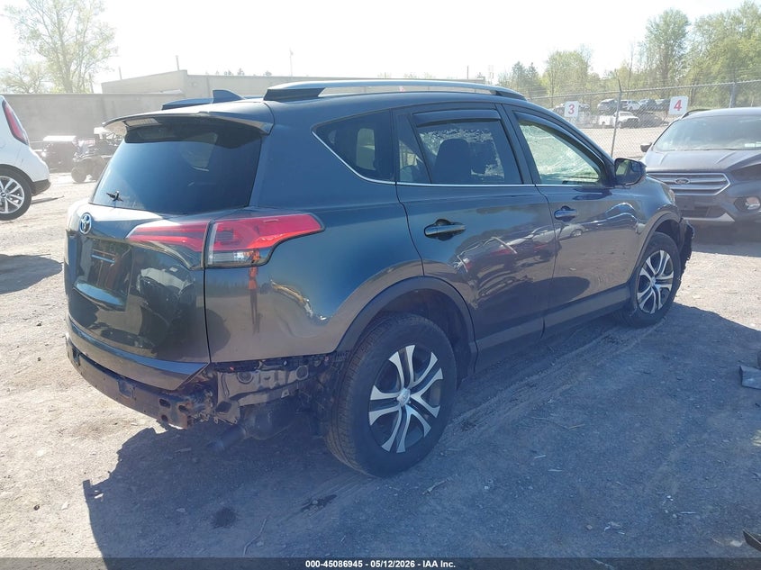 2018 Toyota Rav 4 VIN JTMBFREV1JJ238886 IAAI salvage auction — EXTERIOR BURN, Mv-907A (New York), sold $3,850 on 2026-07-09 (photo 4)