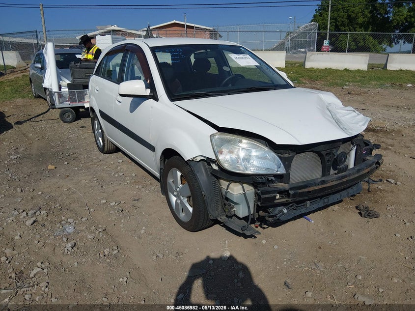 2009 Kia Rio VIN KNADE243496567192 IAAI salvage auction — FRONT END, Clear (Tennessee), sold $350 on 2026-07-11 (photo 1)