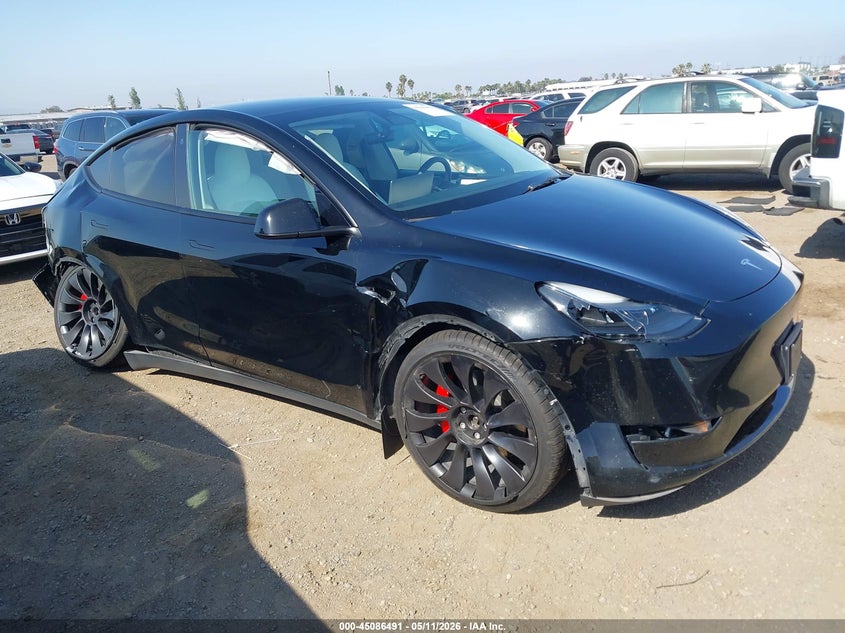 2023 Tesla Model y VIN 7SAYGDEF4PF624014 IAAI salvage auction — RIGHT SIDE, Salvage (California), sold $7,400 on 2026-07-06 (photo 1)