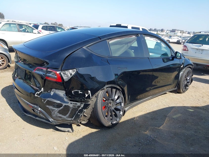 2023 Tesla Model y VIN 7SAYGDEF4PF624014 IAAI salvage auction — RIGHT SIDE, Salvage (California), sold $7,400 on 2026-07-06 (photo 4)
