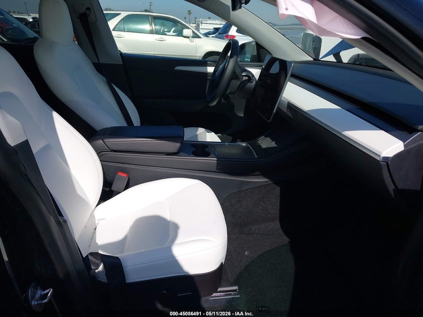 2023 Tesla Model y VIN 7SAYGDEF4PF624014 IAAI salvage auction — RIGHT SIDE, Salvage (California), sold $7,400 on 2026-07-06 (photo 5)