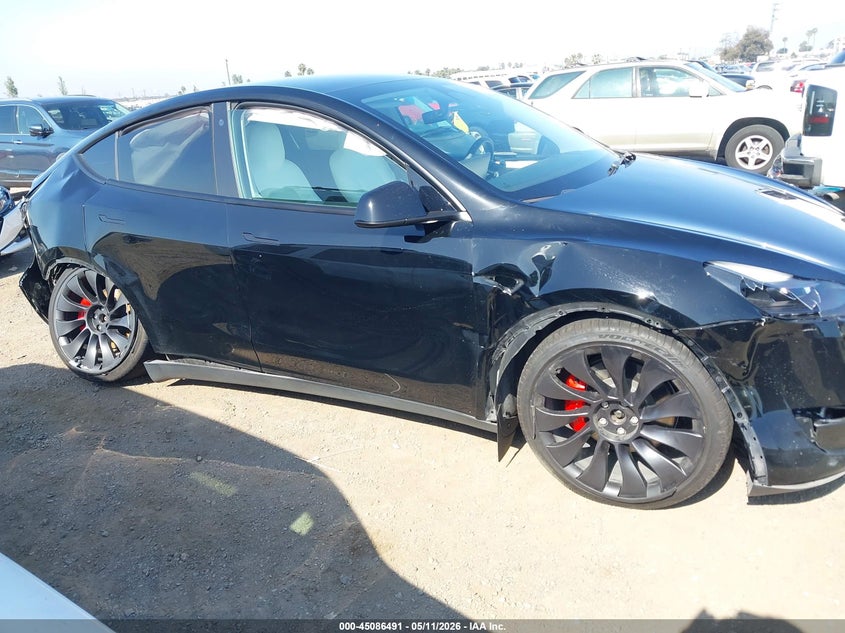 2023 Tesla Model y VIN 7SAYGDEF4PF624014 IAAI salvage auction — RIGHT SIDE, Salvage (California), sold $7,400 on 2026-07-06 (photo 6)