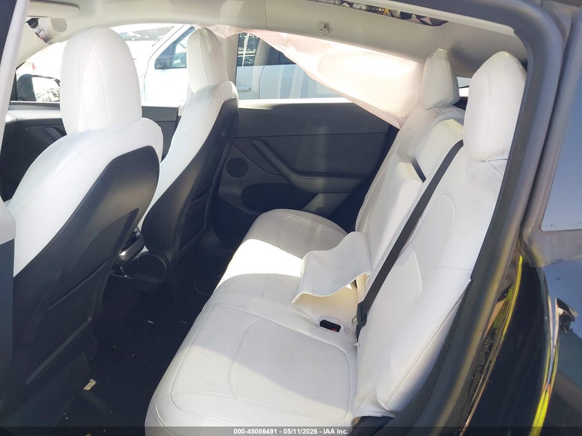 2023 Tesla Model y VIN 7SAYGDEF4PF624014 IAAI salvage auction — RIGHT SIDE, Salvage (California), sold $7,400 on 2026-07-06 (photo 8)