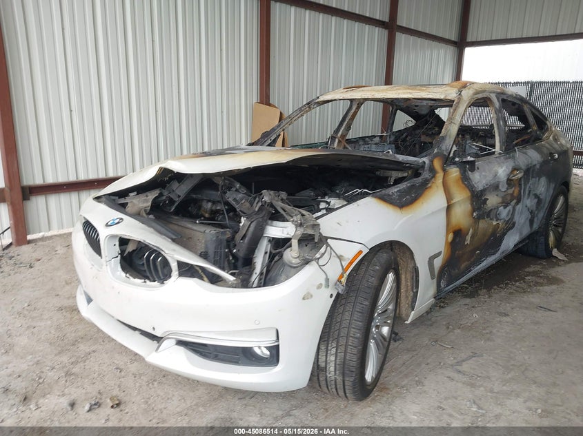 2015 BMW 3er VIN WBA3X9C52FD868780 IAAI salvage auction — Burn Interior, Non-Repairable (Texas), sold $325 on 2026-07-07 (photo 2)