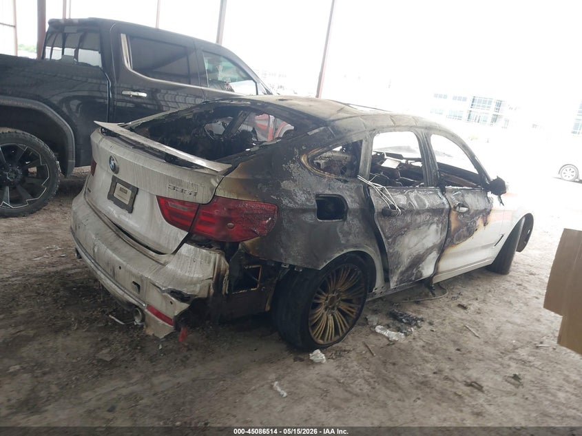 2015 BMW 3er VIN WBA3X9C52FD868780 IAAI salvage auction — Burn Interior, Non-Repairable (Texas), sold $325 on 2026-07-07 (photo 4)