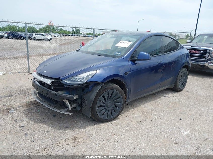 2022 Tesla Model y VIN 7SAYGDEE5NF370754 IAAI salvage auction — FRONT & REAR, Original (Texas), sold $8,400 on 2026-07-23 (photo 2)