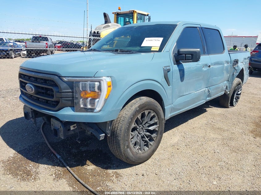 2023 Ford F-150 VIN 1FTEW1C53PKD15147 IAAI salvage auction — SIDE, Original (Texas), sold $9,100 on 2026-08-01 (photo 2)