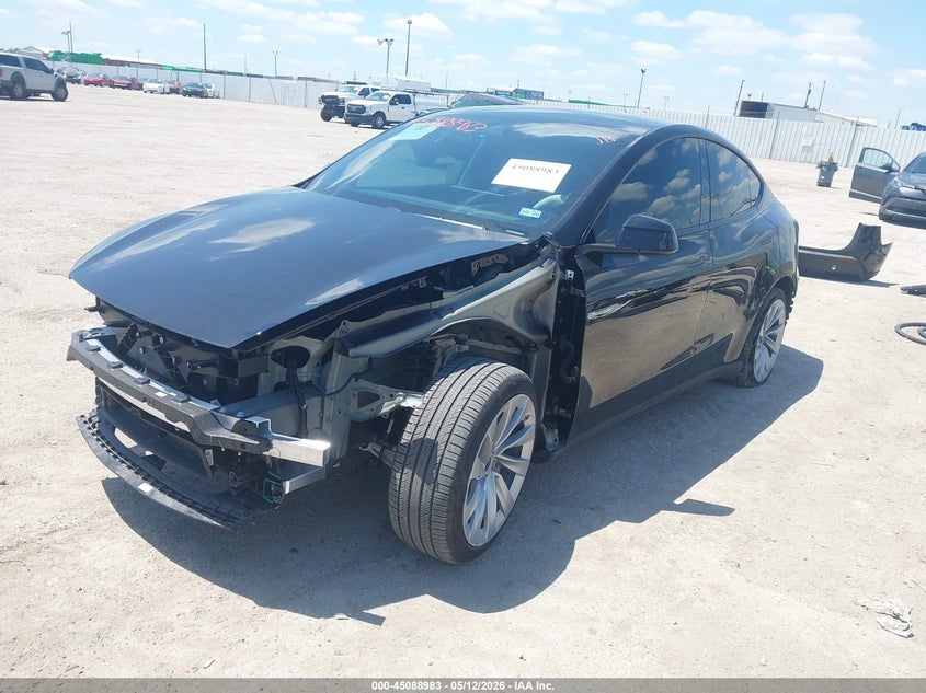 2026 Tesla Model y VIN 7SAYGDED1TA582987 IAAI salvage auction — FRONT & REAR, Original (Texas), sold $19,500 on 2026-07-09 (photo 2)