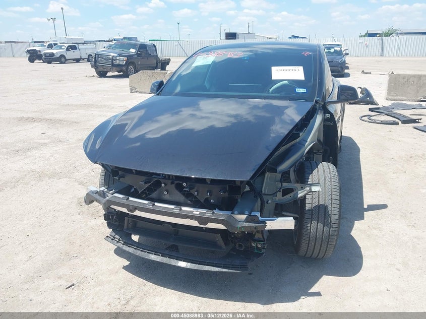 2026 Tesla Model y VIN 7SAYGDED1TA582987 IAAI salvage auction — FRONT & REAR, Original (Texas), sold $19,500 on 2026-07-09 (photo 6)