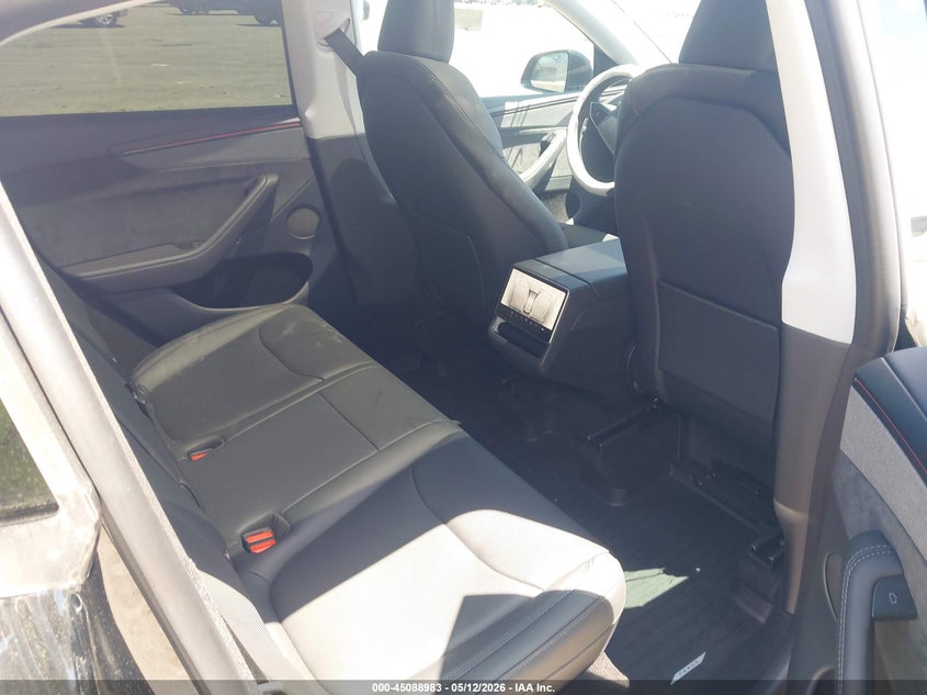 2026 Tesla Model y VIN 7SAYGDED1TA582987 IAAI salvage auction — FRONT & REAR, Original (Texas), sold $19,500 on 2026-07-09 (photo 8)