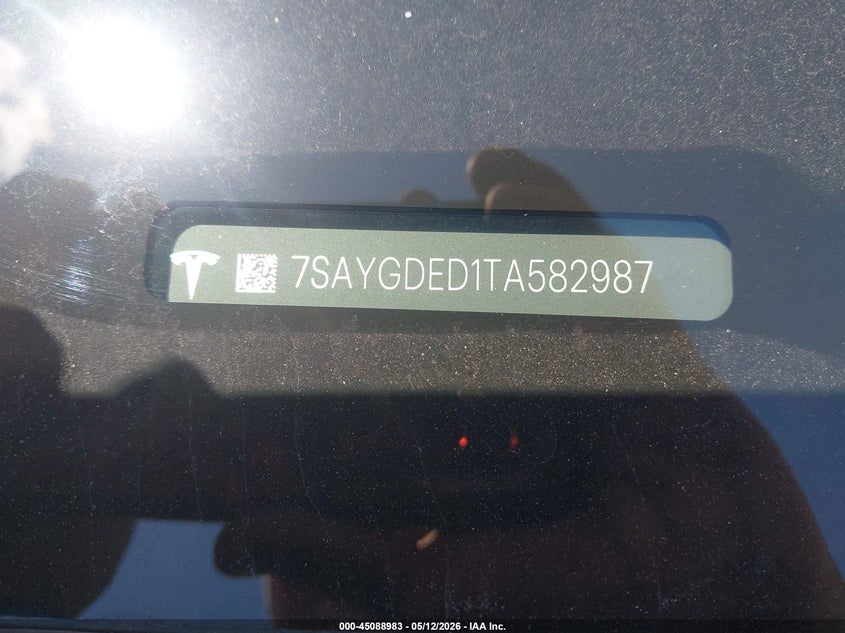 2026 Tesla Model y VIN 7SAYGDED1TA582987 IAAI salvage auction — FRONT & REAR, Original (Texas), sold $19,500 on 2026-07-09 (photo 9)