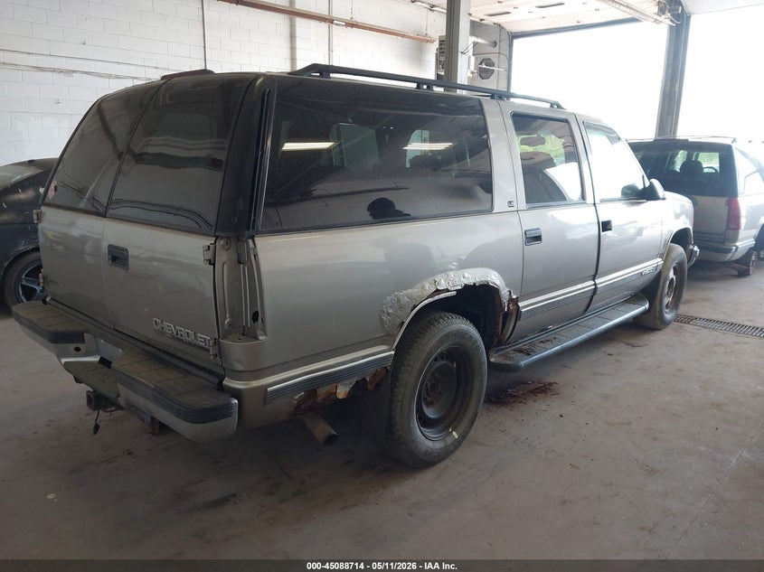1999 Chevrolet Suburban 1500 VIN 3GNFK16R2XG204604 IAAI salvage auction — NORMAL WEAR, Clear (Minnesota), sold $475 on 2026-07-08 (photo 4)