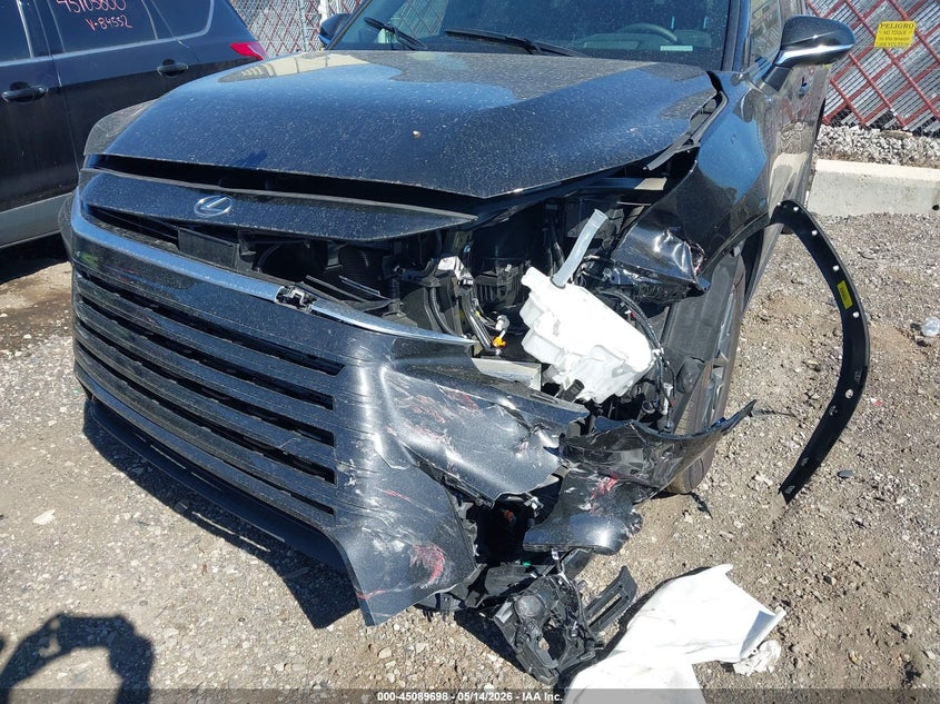2026 Lexus Tx VIN 5TDAAAB68TS068721 IAAI salvage auction — LEFT FRONT, Salvage (Michigan), sold $23,200 on 2026-07-30 (photo 6)