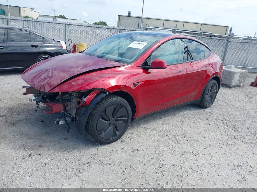 2026 Tesla Model y VIN 7SAYGDEE4TA387961 IAAI salvage auction — FRONT END, Rebuildable (Florida), sold $21,200 on 2026-07-23 (photo 2)