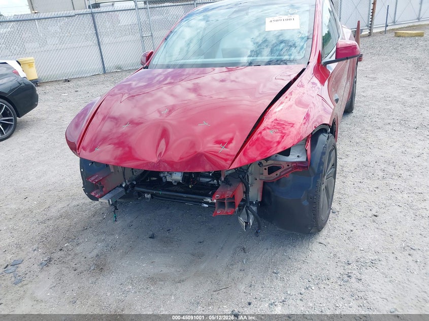 2026 Tesla Model y VIN 7SAYGDEE4TA387961 IAAI salvage auction — FRONT END, Rebuildable (Florida), sold $21,200 on 2026-07-23 (photo 6)
