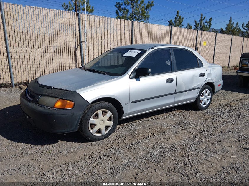 1998 Mazda Protege VIN JM1BC1412W0171947 IAAI salvage auction — NORMAL WEAR, Regular (Nevada), sold $100 on 2026-07-24 (photo 2)