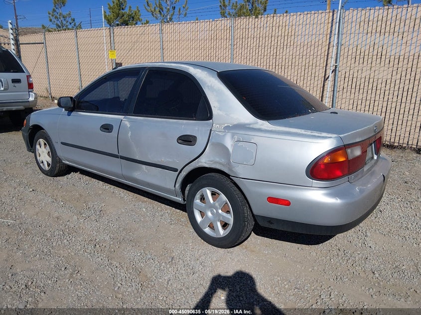 1998 Mazda Protege VIN JM1BC1412W0171947 IAAI salvage auction — NORMAL WEAR, Regular (Nevada), sold $100 on 2026-07-24 (photo 3)