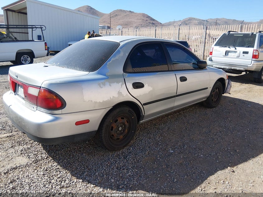 1998 Mazda Protege VIN JM1BC1412W0171947 IAAI salvage auction — NORMAL WEAR, Regular (Nevada), sold $100 on 2026-07-24 (photo 4)
